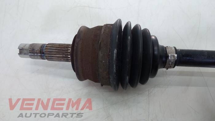 Front drive shaft, left from a Opel Adam 1.2 16V 2017