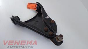 Usagé Bras de suspension avant gauche Renault Twingo II (CN) 1.2 16V Prix € 19,99 Règlement à la marge proposé par Venema Autoparts