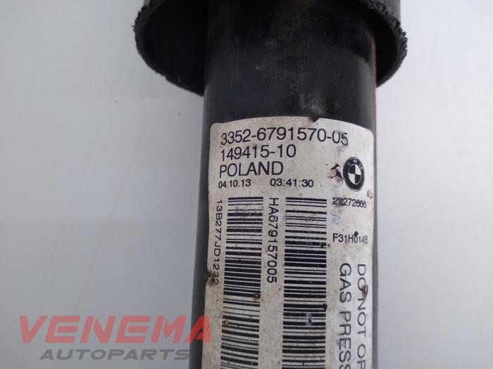 Rear shock absorber, left from a BMW 3 serie Touring (F31) 316d 2.0 16V 2013