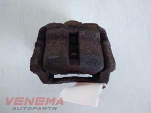 Used Front brake calliper, left Renault Twingo II (CN) 1.2 16V Price € 29,99 Margin scheme offered by Venema Autoparts