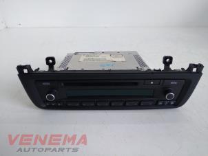 Used Radio CD player BMW 1 serie (F20) 114i 1.6 16V Price € 99,99 Margin scheme offered by Venema Autoparts