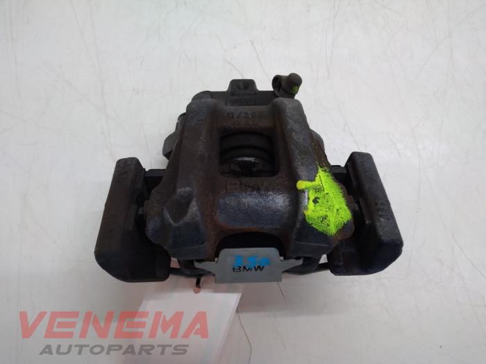 Gebrauchte Bremszange links hinten BMW 1 serie (F20) 114d 1.6 16V Preis € 14,99 Margenregelung angeboten von Venema Autoparts