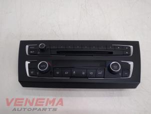 Used Heater control panel BMW 1 serie (F20) 114d 1.6 16V Price € 149,99 Margin scheme offered by Venema Autoparts