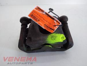 Used Front brake calliper, left BMW 1 serie (E87/87N) 116i 1.6 16V Price € 29,99 Margin scheme offered by Venema Autoparts
