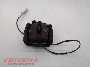 Used Rear brake calliper, right BMW 1 serie (E87/87N) 118i 16V Price € 29,99 Margin scheme offered by Venema Autoparts
