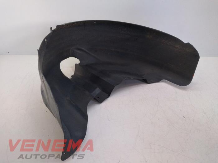 Wheel arch liner from a Volkswagen Polo V (6R) 1.2 TSI 2013