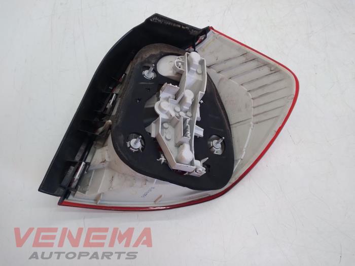 Taillight, left from a BMW 1 serie (E81) 116i 2.0 16V 2010