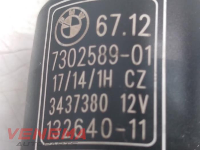 Scheibensprüherpumpe vorne van een BMW 4 serie Gran Coupe (F36) 420i 2.0 Turbo 16V 2015