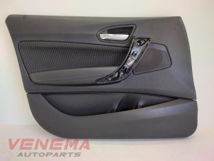 Używane Tapicerka drzwi lewych przednich wersja 4-drzwiowa BMW 1 serie (F20) 118i 1.6 16V Cena € 49,99 Procedura marży oferowane przez Venema Autoparts