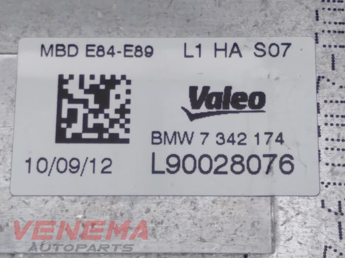 Xenon module from a BMW X1 (E84) sDrive 20i 2.0 16V Twin Power Turbo 2012