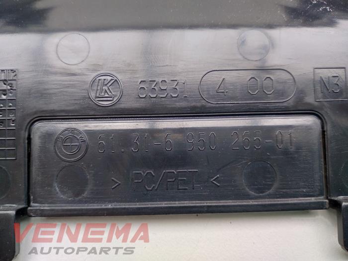 Couvercle colonne de direction d'un BMW 1 serie (E81) 116i 2.0 16V 2011