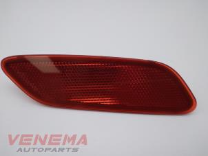 Used Rear bumper reflector, left Opel Corsa F (UB/UH/UP) 1.2 12V 100 Price € 14,99 Margin scheme offered by Venema Autoparts