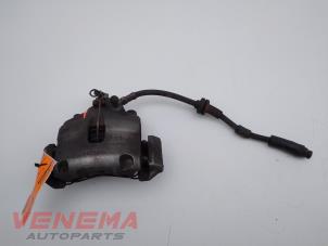Used Front brake calliper, left Fiat 500 (312) 0.9 TwinAir 80 Price € 24,99 Margin scheme offered by Venema Autoparts
