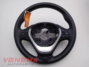 Used Steering wheel BMW 3 serie Touring (F31) 320i 2.0 16V Price € 124,99 Margin scheme offered by Venema Autoparts