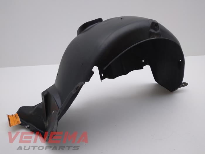 Wheel arch liner from a Seat Ibiza IV SC (6J1) 1.4 16V 2014