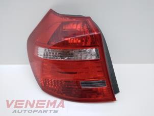 Used Taillight, left BMW 1 serie (E81) 116i 1.6 16V Price € 38,99 Margin scheme offered by Venema Autoparts