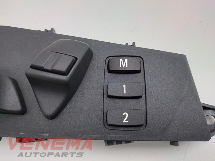 Electric seat switch from a BMW X5 (E70) xDrive 35d 3.0 24V 2009