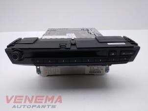 Używane Radioodtwarzacz CD BMW X5 (E70) xDrive 35d 3.0 24V Cena € 699,99 Procedura marży oferowane przez Venema Autoparts