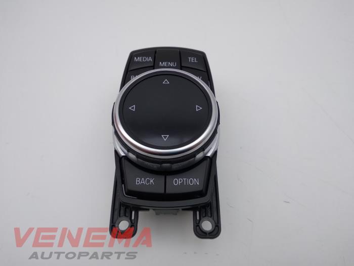 Botón I-Drive de un BMW 1 serie (F20) 116d 1.5 12V TwinPower 2018