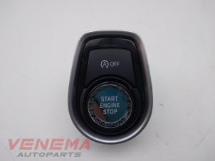 Gebrauchte Start/Stopp Schalter BMW 1 serie (F20) 116d 1.5 12V TwinPower Preis € 14,99 Margenregelung angeboten von Venema Autoparts
