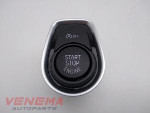 Gebrauchte Start/Stopp Schalter BMW 1 serie (F20) 116i 1.5 12V Preis € 14,99 Margenregelung angeboten von Venema Autoparts
