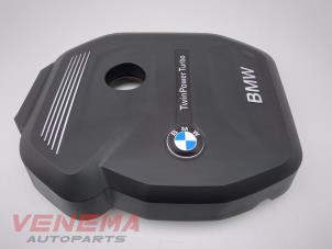 Usados Chapa protectora motor BMW 1 serie (F20) 116i 1.5 12V Precio € 69,99 Norma de margen ofrecido por Venema Autoparts