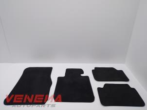 Używane Zestaw dywaników BMW 1 serie (F20) 116i 1.5 12V Cena € 49,99 Procedura marży oferowane przez Venema Autoparts