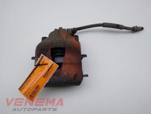 Used Front brake calliper, left Volkswagen Polo V (6R) 1.0 12V BlueMotion Technology Price € 19,99 Margin scheme offered by Venema Autoparts