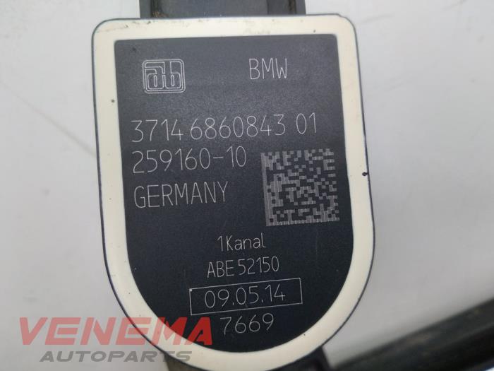 Xenon height adjustment from a BMW 3 serie Touring (F31) 320d 2.0 16V 2015