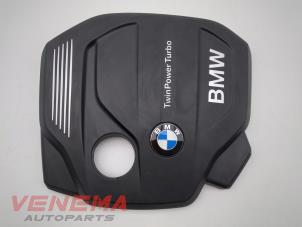 Usados Chapa protectora motor BMW 1 serie (F20) 116d 1.5 12V TwinPower Precio € 34,99 Norma de margen ofrecido por Venema Autoparts