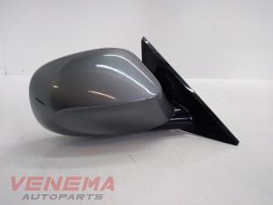 Used Wing mirror, right BMW 1 serie (E88) 118d 16V Price € 64,99 Margin scheme offered by Venema Autoparts