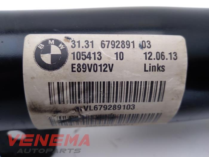 Front shock absorber rod, left from a BMW Z4 Roadster (E89) sDrive 18i 2.0 16V 2014