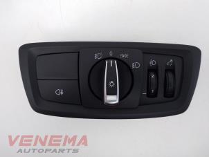 Used Light switch BMW 1 serie (F20) 118i 1.5 TwinPower 12V Price € 29,99 Margin scheme offered by Venema Autoparts