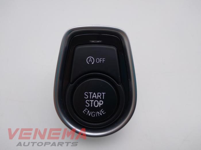 Start/Stopp Schalter van een BMW 1 serie (F20) 118i 1.5 TwinPower 12V 2018