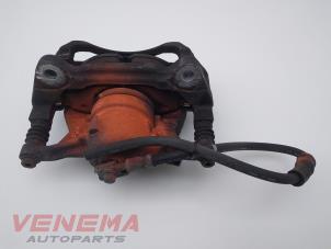 Used Front brake calliper, left Volkswagen Caddy IV 2.0 TDI 102 Price € 19,99 Margin scheme offered by Venema Autoparts
