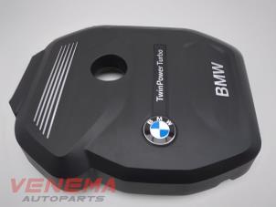 Used Engine protection panel BMW 1 serie (F20) 118i 1.5 TwinPower 12V Price € 69,99 Margin scheme offered by Venema Autoparts