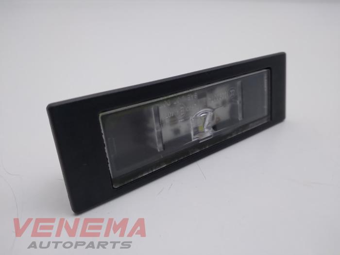 Registration plate light from a BMW 1 serie (F20) 118i 1.5 TwinPower 12V 2018
