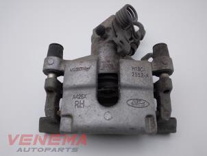 Used Rear brake calliper, right Ford Fiesta 7 1.0 EcoBoost 12V 100 Price € 59,99 Margin scheme offered by Venema Autoparts