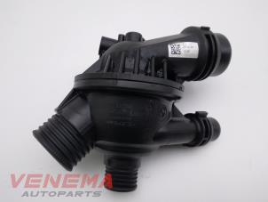 Used Thermostat housing BMW 3 serie Touring (E91) 318i 16V Price € 69,99 Margin scheme offered by Venema Autoparts