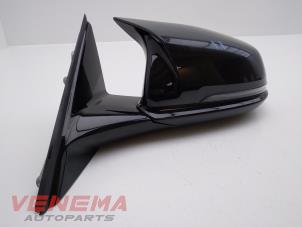 Used Wing mirror, left BMW 1 serie (F40) 118i 1.5 TwinPower 12V Price € 349,99 Margin scheme offered by Venema Autoparts