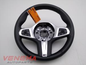 Used Steering wheel BMW 1 serie (F40) 118i 1.5 TwinPower 12V Price € 349,99 Margin scheme offered by Venema Autoparts
