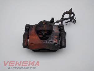 Used Front brake calliper, left Mini Mini (F55) 1.5 12V One Price € 49,99 Margin scheme offered by Venema Autoparts