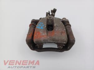 Gebrauchte Bremszange links hinten Mini Coupe (R58) 1.6 16V Cooper Preis € 29,99 Margenregelung angeboten von Venema Autoparts