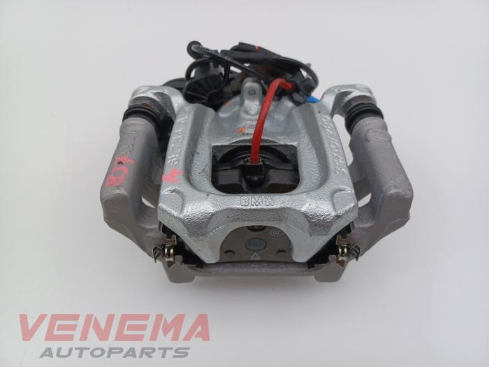 Gebrauchte Bremszange rechts hinten BMW 1 serie (F70) 120 1.5 TwinPower Turbo 12V Preis € 199,99 Margenregelung angeboten von Venema Autoparts