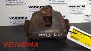 Used Front brake calliper, left Ford Focus 2 1.6 16V Price on request offered by Venema Autoparts
