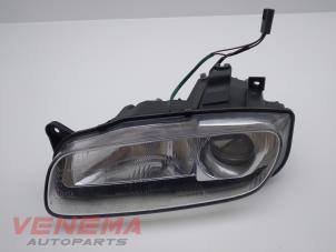 Używane Reflektor lewy Mazda 323 F (BA14) 1.8i GLX,GT 16V Cena € 29,99 Procedura marży oferowane przez Venema Autoparts