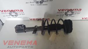 Used Front shock absorber rod, left Renault Clio III (BR/CR) 1.2 16V 65 Price € 75,00 Margin scheme offered by Venema Autoparts