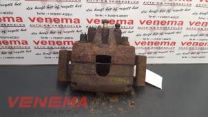 Used Front brake calliper, left Chrysler Voyager/Grand Voyager (RG) 2.4 16V Price € 75,00 Margin scheme offered by Venema Autoparts