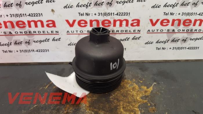 Oil filter cover from a Ford Mondeo IV Wagon 2.0 TDCi 115 16V 2008