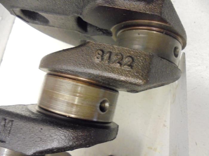Crankshaft from a Opel Corsa C (F08/68) 1.2 16V 2001